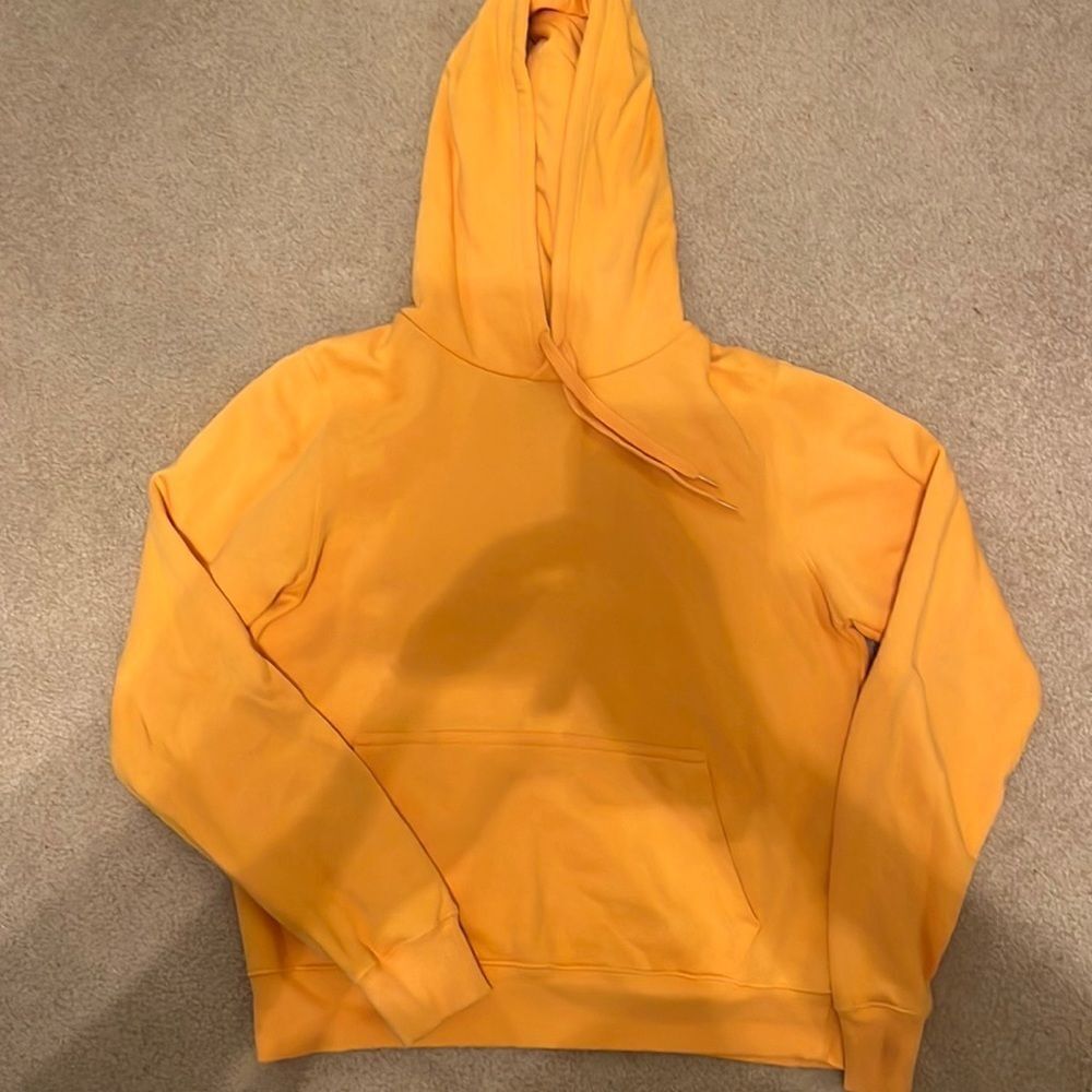 Urban outfitters orange long sleeved hoodie. size medium